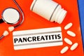 Pancreatitis-inscription of the diagnosis text in the medical folder. Inflammation of the pancreas, diagnosis by a doctor.