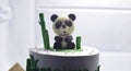 Panda and bamboo made of fondants for cake decoration in refrigerator