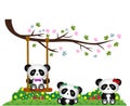 Panda playing under tree branches