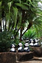 Panda statue in palm garden