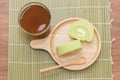 Pandan roll cake and jasmine tea Royalty Free Stock Photo