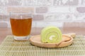 Pandan roll cake and jasmine tea Royalty Free Stock Photo