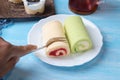 Pandan roll cake and strawberry swiss roll cake Royalty Free Stock Photo