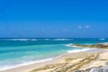 White sand, turquoise waters against the blue sky at Pandawa Beach, Bali, Indonesia.