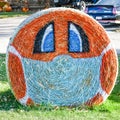 Pandemic Pumpkin Haybale Wearing Mask