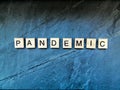 Pandemic text with on blue background Royalty Free Stock Photo