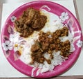Maharashtrian chicken kolhapuri with chana daal amti gravy on rice Royalty Free Stock Photo