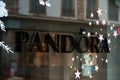 Pandora sign on the window of the famous jewelry chain