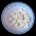 Paneer or cottage cheese cube close up, Isolated on Black background
