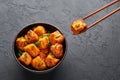 Paneer Manchurian or Paneer 65 in bowl at black slate background Royalty Free Stock Photo