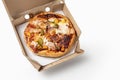 Paneer pizza in open delivery box in cardboard box on white background. Top view. Space for text. Pizza delivery Royalty Free Stock Photo