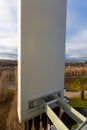 Panel antenna of GSM DCS UMTS LTE bands is as part of communication equipment of basic station are installed on the