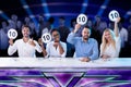 Panel Judges Holding 10 Score Signs Royalty Free Stock Photo