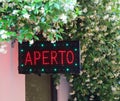 Panel with led and the text APERTO that means OPEN in Italian la Royalty Free Stock Photo
