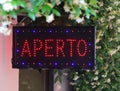Panel with led and text APERTO that means OPEN in Italian langua Royalty Free Stock Photo