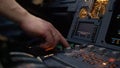 Panel of switches on an aircraft flight deck. Autopilot control element of an airliner. Pilot controls the aircraft