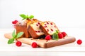 Panettone traditional Italian fruitcake, sliced into pieces and presented on wooden serving board. Banner