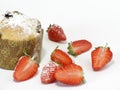 Panettoni and strawberries with icing sugar Royalty Free Stock Photo