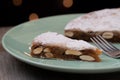 Panforte of Siena slice on a plate, the typical Christmas Italian cake