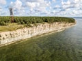 Panga coastal cliff and lighthouse Panga pank, Saaremaa island, near Kuressaare, Estonia. North-Estonian limestone escarpment,