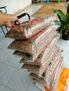 Pile of Red Rice Products packaged in plastic to be sold to the market