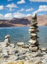 Pangong Tso mountain lake panorama with Buddhist stupas in forefront