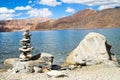 Pangong Tso mountain lake panorama with Buddhist stupas in forefront