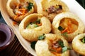 Pani Puri indian street food. Golgappe, Chat item, India. Royalty Free Stock Photo