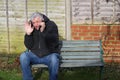 Panic attack man on a bench. Royalty Free Stock Photo