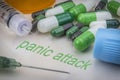 Panic attack, medicines and syringes as concept