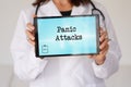 panic attacks. health problem. woman doctor showing words written on a tablet Royalty Free Stock Photo
