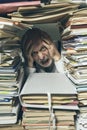 Panicked businessman overwhelmed with paperwork