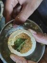 Panipuri is in the hands of a girl.Panipuri is a street food in India. Royalty Free Stock Photo