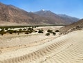 Panj river, sand dune and Pamir mountains Tajikistan