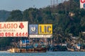 Large advertising hoarding of LIC and other companies at the riverside fishing port of Porvorim
