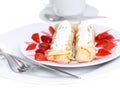 Pankcake with cream , with rolled fruit inside. Royalty Free Stock Photo