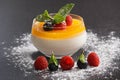 Panna cotta with berries closeup