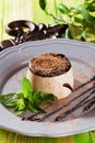 Panna cotta with cocoa, chocolate, still life plate style Provence, a wooden table, board, beautiful, elegant Royalty Free Stock Photo