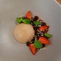 panna cotta pudding, strawberries, mint leaves and brownies