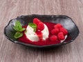 Panna cotta with raspberry coulis