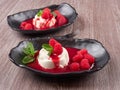 Panna cotta with raspberry coulis