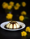 Pannacotta dessert with flowers Royalty Free Stock Photo