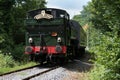 The Pannier Tank 6412 locomotive train operating on the South Devon Railway between Totnes and Buckfastleigh pulling its carriages