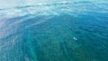 Panning clip of surfer riding a waves blue ocean and in the end falls. Balangan Beach, Bali, Indonesia Royalty Free Stock Photo