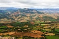 Panning of green and brown farm fields grids. Agriculture concept