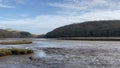 Panning shot of the Erme Estuary in Devon at low tide