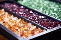 panning tray with small gemstones Royalty Free Stock Photo