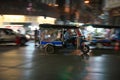 Panning of Tuk Tuk running at China Town, Yaowarat, at night in Bangkok Royalty Free Stock Photo