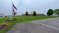 Panning up on the exterior of Ottumwa, Iowa Regional Airport on a cloudy rainy day