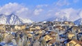Pano Aerial view of a homes in snowy neighborhood of scenic Highland Utah in winter Royalty Free Stock Photo